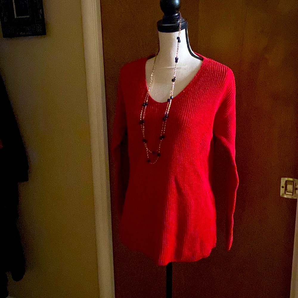 Long sleeve red sweater V-neck it’s used I have worn it a couple times